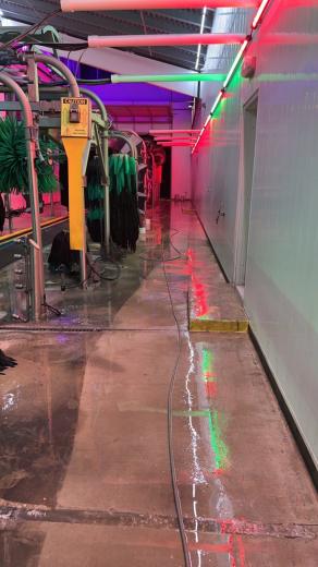 Car wash tunnel walkway, during cleaning