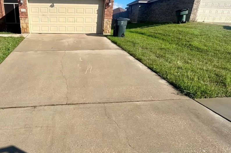 The same driveway cleaned bright