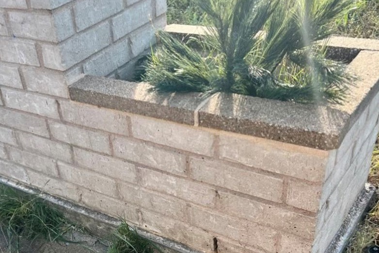 The same brick planter washed clean