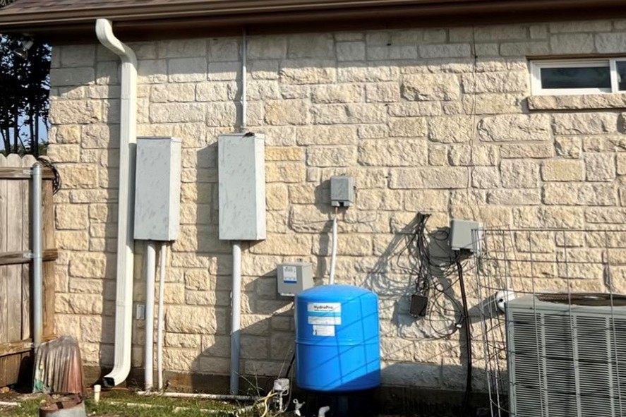 The same stone wall soft washed clean